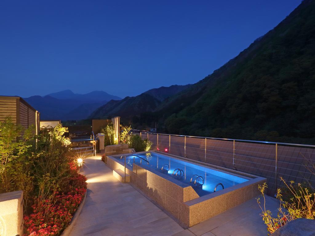 Hotel Asaya Nikko Exterior foto A rooftop onsen in Japan